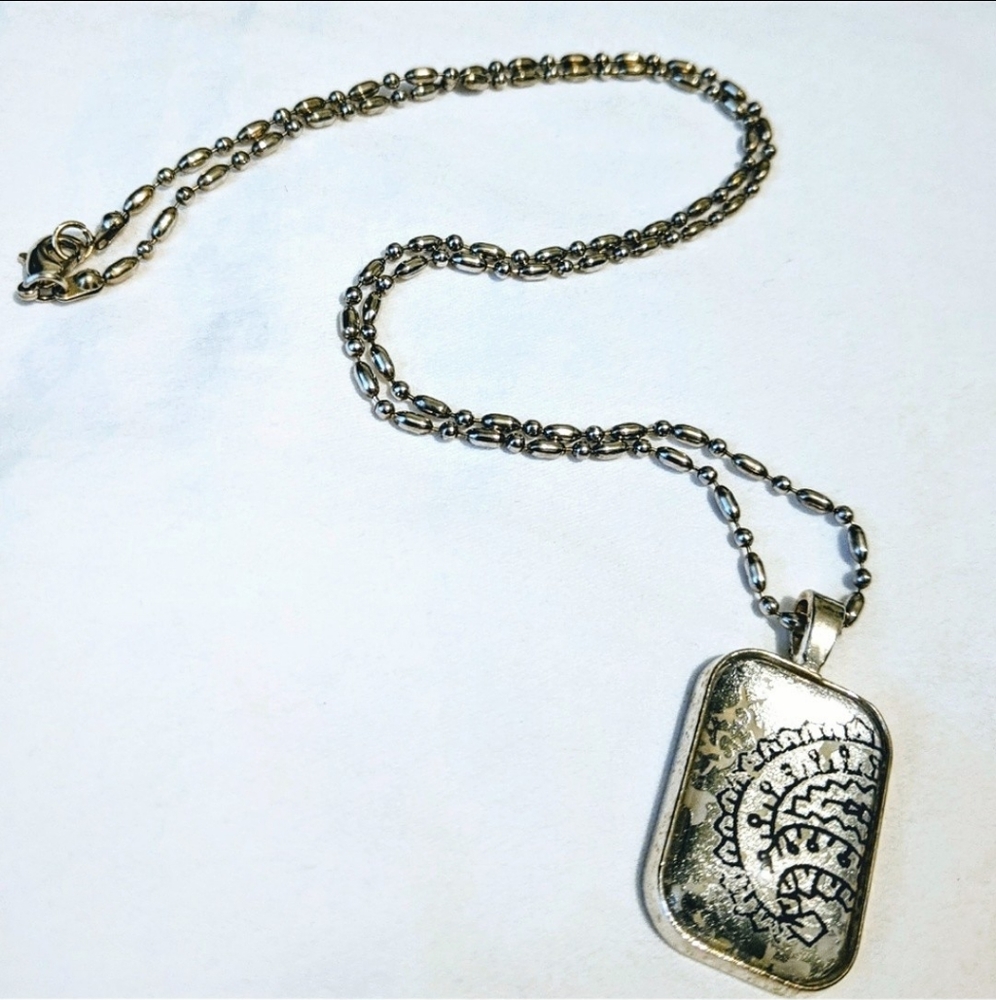 Silver paisley pendant necklace with chain
